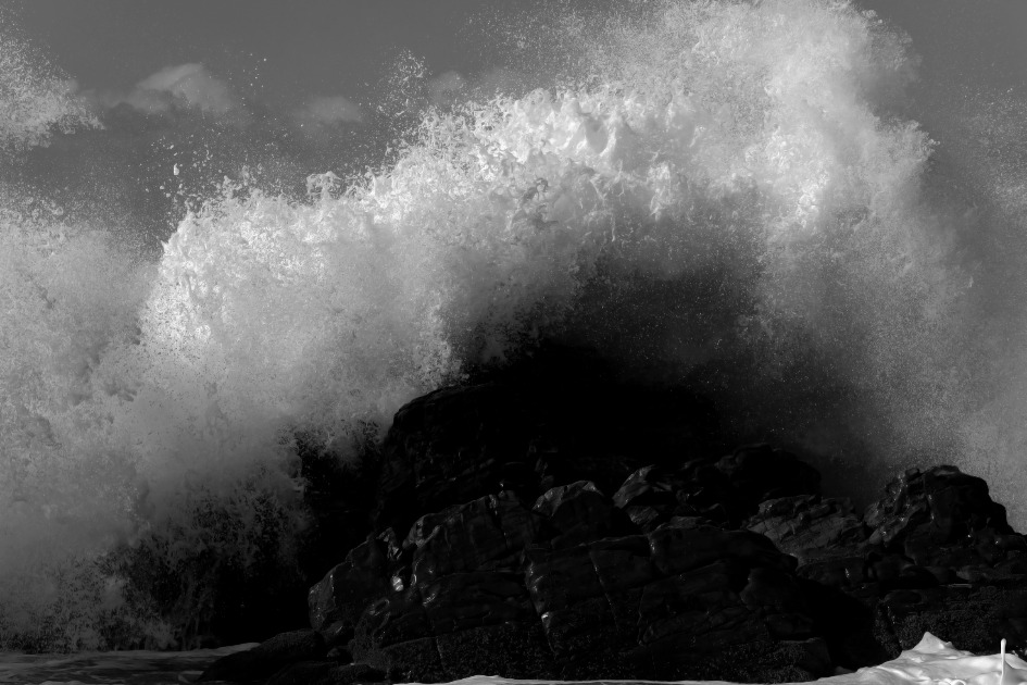 A thunderous wave collapses onto shore at The Point, Mossel Bay.