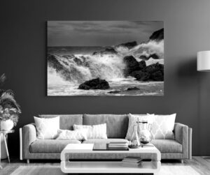 Waves pouring over weathered rocks at The Point, Mossel Bay.