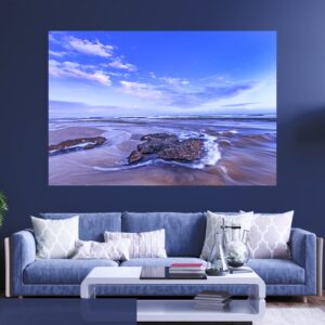 Rocks emerging from the waves at low tide, Klein Brak Beach.