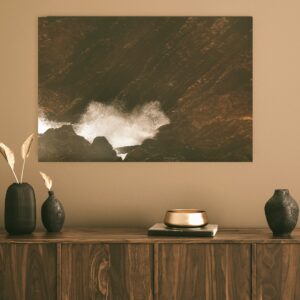 Water meets stone at the jagged coastline of The Point, Mossel Bay.