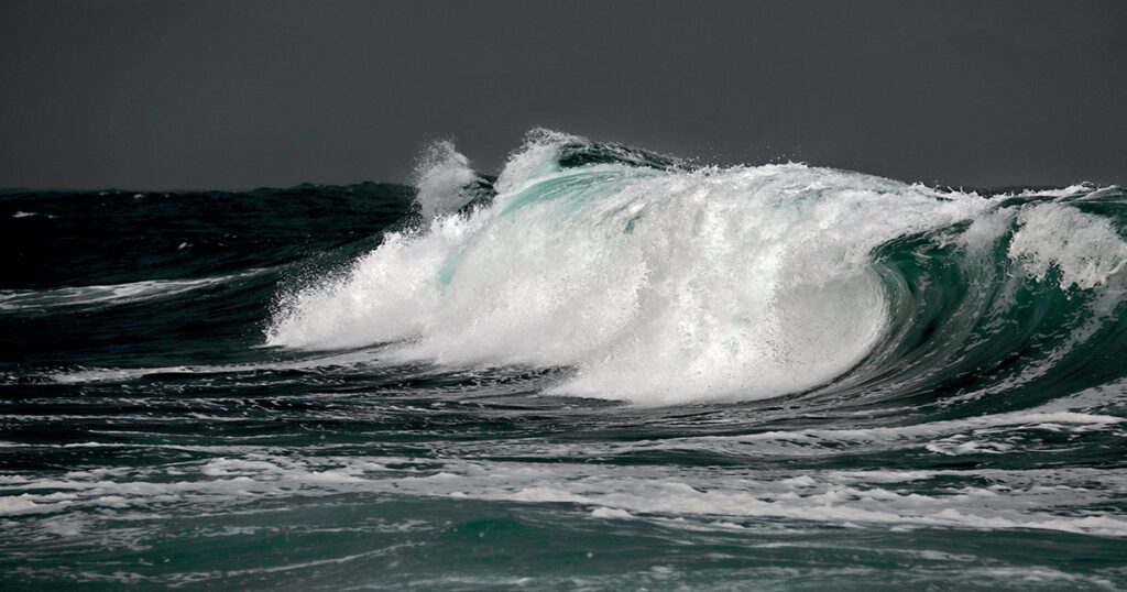 Roiling waves pound the coastline, Mossel Bay.