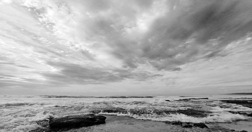The tide rises over the rock pools at Klein Brak Beach.