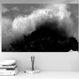 A thunderous wave collapses onto shore at The Point, Mossel Bay.