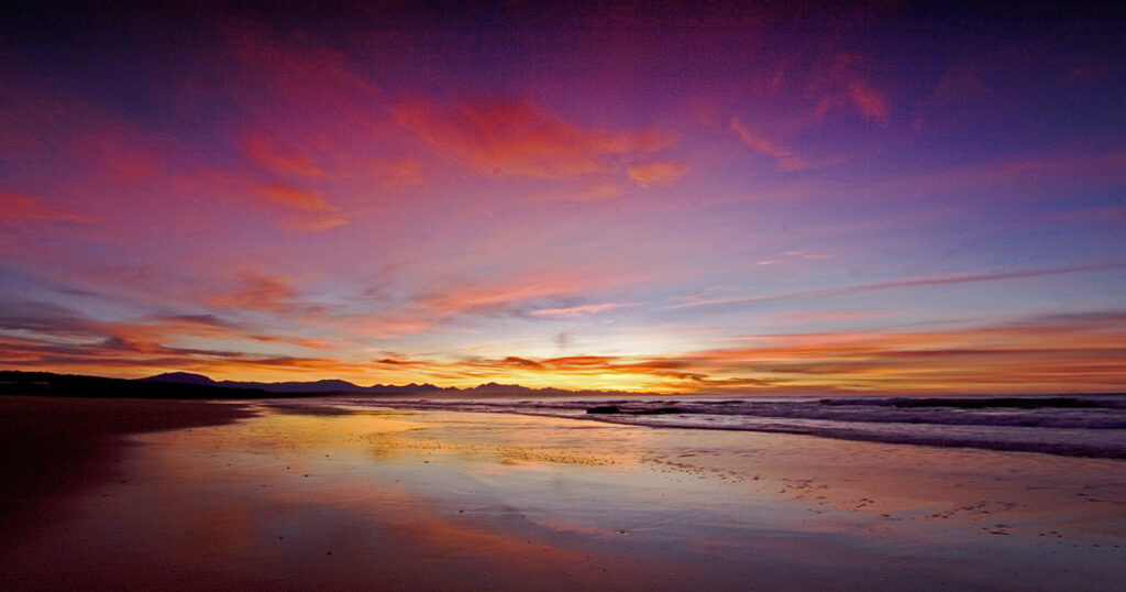 Low tide at Hartenbos Beach made for a magical reflection of sky on sand.